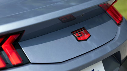 2025 Ford Mustang GT OEM SR3Z-6342528-A 60th Anniversary Rear Deck Lid Emblem - Black & Red